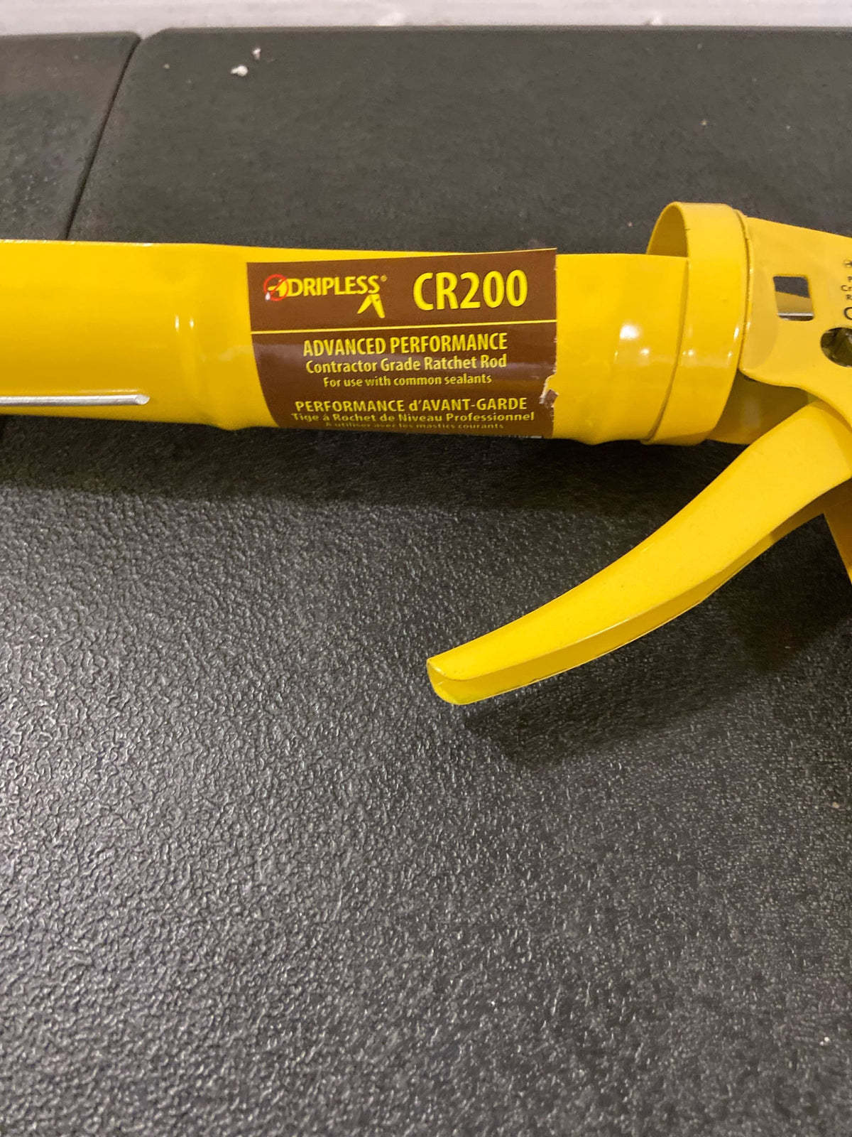 Dripless CR200 Contractor Cradle Frame Ratchet Drive Caulk Gun | 10 oz Cartridge Capacity | Caulking Gun with Machined Ratchet Teeth | Ladder Hook, Seal Punch and Cutter Built in | Contractor Grade