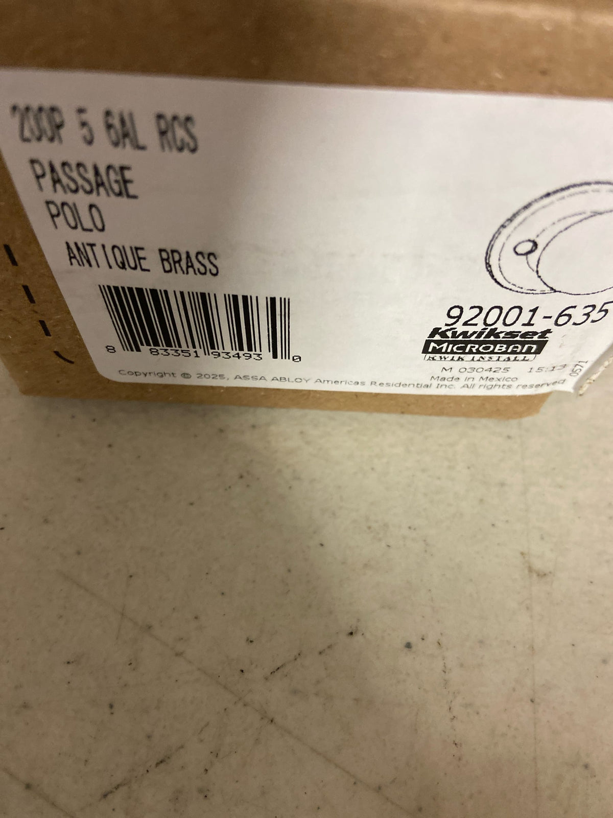 Kwikset 200P-5 Polo Passage Door Knob Set with Round Rose - Antique Brass