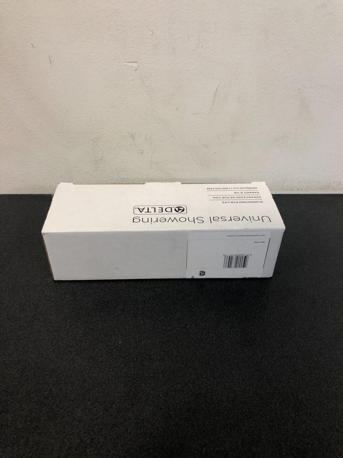 Delta 5-3/4" Wall Mounted Shower Arm and Shower Arm Flange