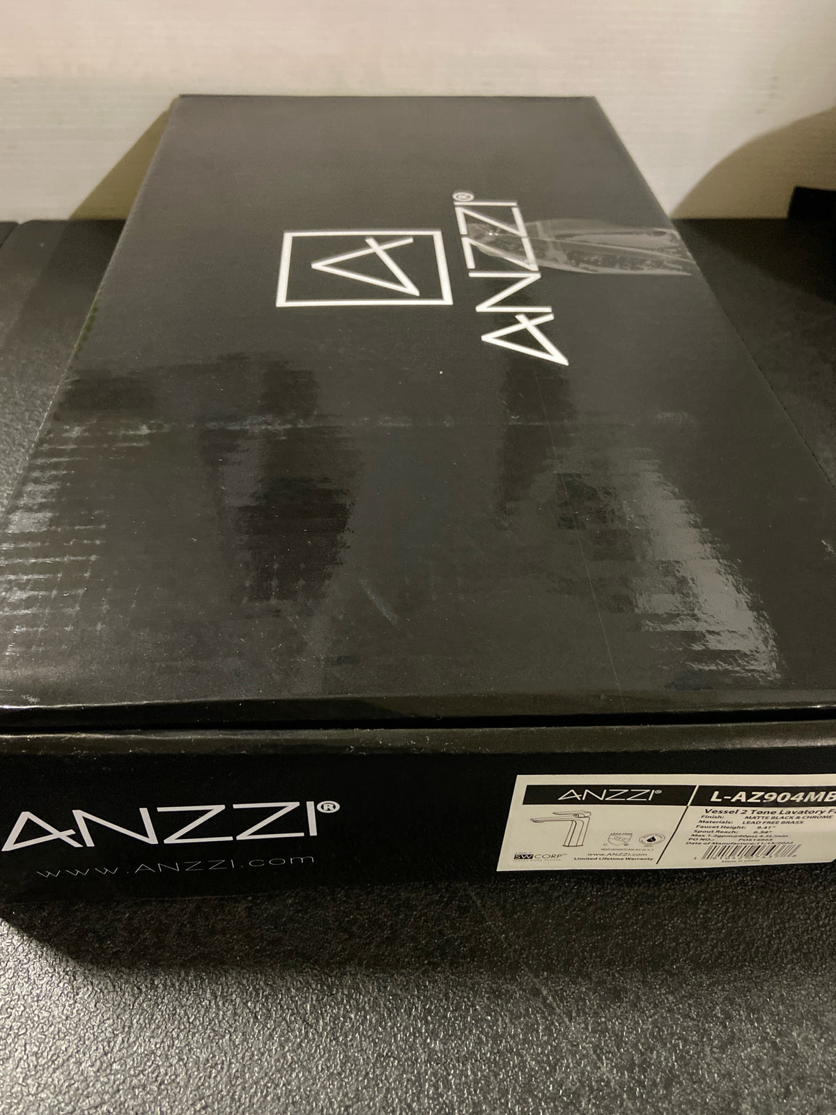 Anzzi L-AZ904MB-CH 1.2 GPM Single Hole Bathroom Faucet with Pop-Up Drain Assembly - Matte Black / Chrome