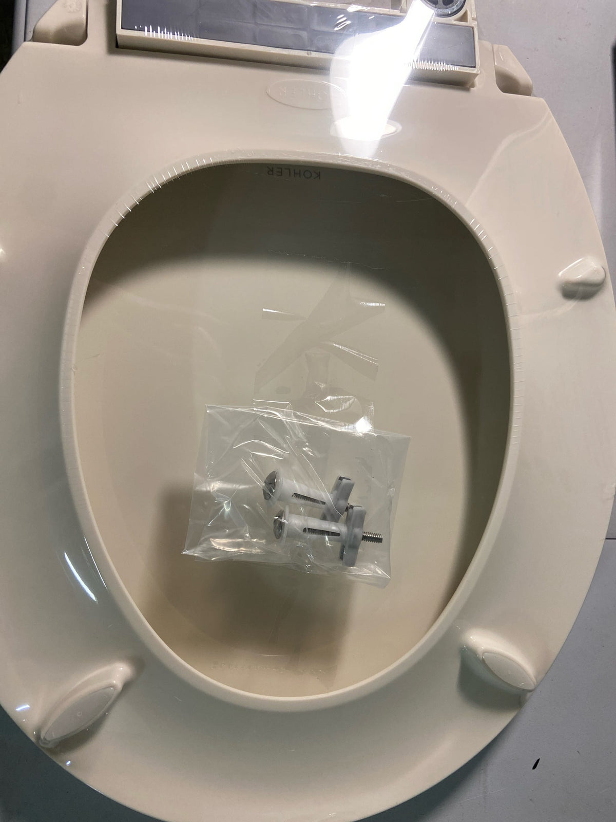 Kohler K-24494-A-96 Border Round Closed-Front Toilet Seat with Soft Close and Quick Release - Biscuit