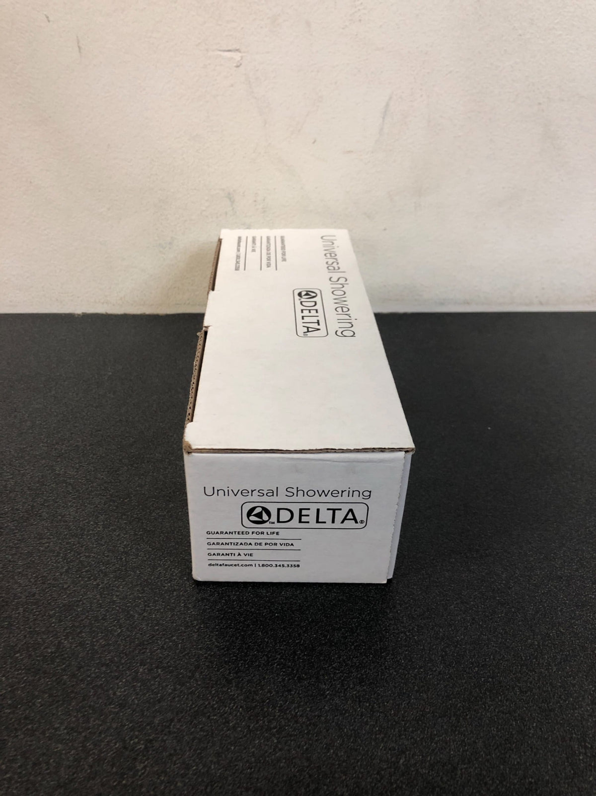Delta 5-3/4" Wall Mounted Shower Arm and Shower Arm Flange