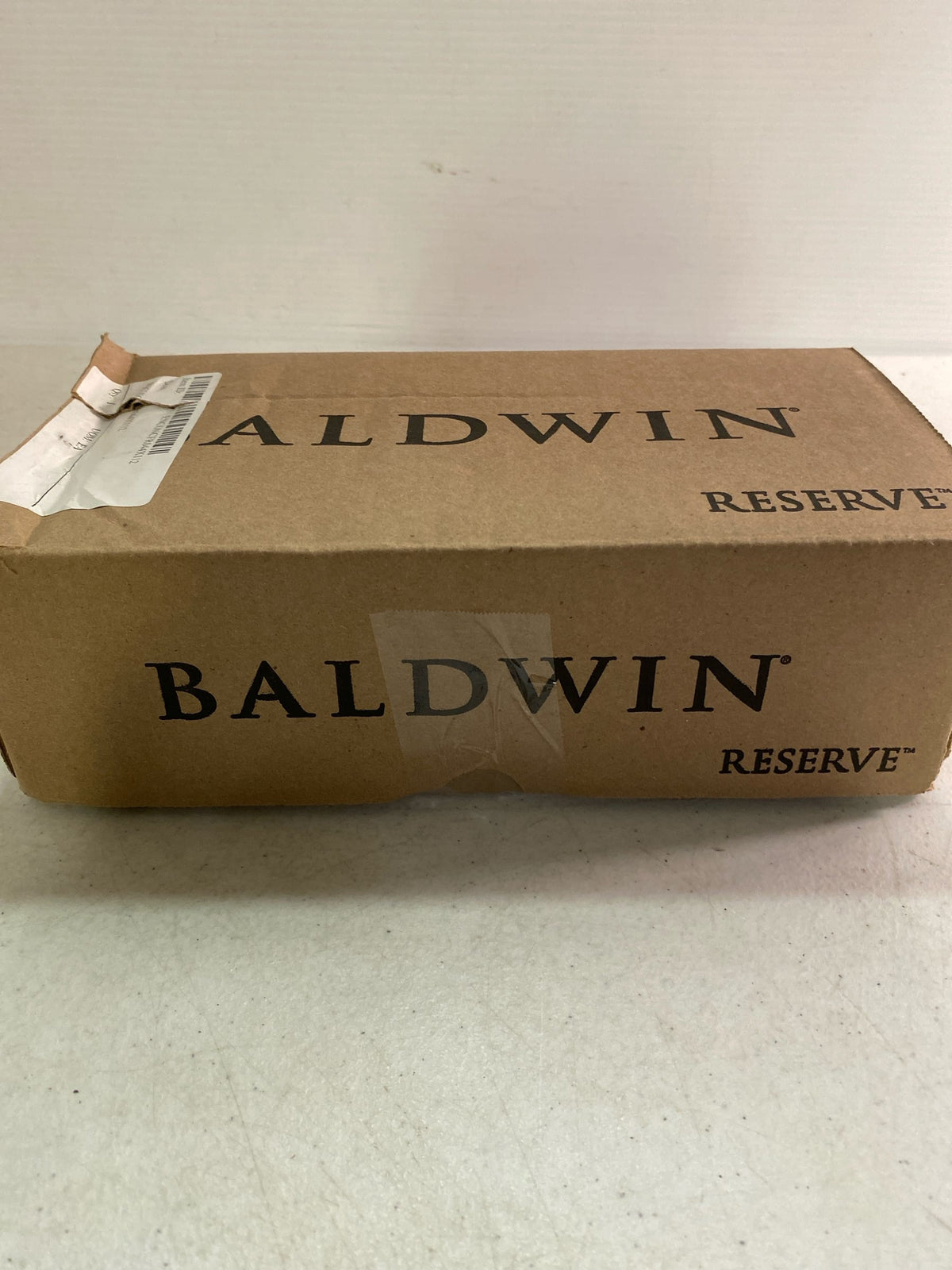 Baldwin ENCONCFR044 Contemporary Single Cylinder Keyed Entry Door Knob Set with 5 Inch Rectangle Rose from the Reserve Collection - Satin Brass