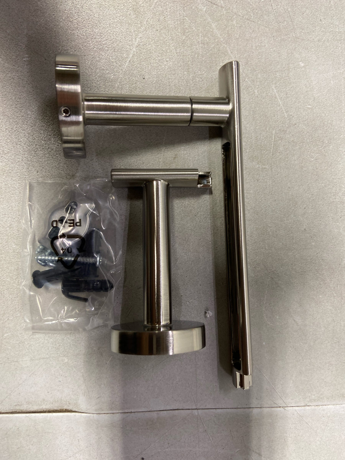 Delta 74250-SS Altado Wall Mounted Pivoting Toilet Paper Holder - Brilliance Stainless