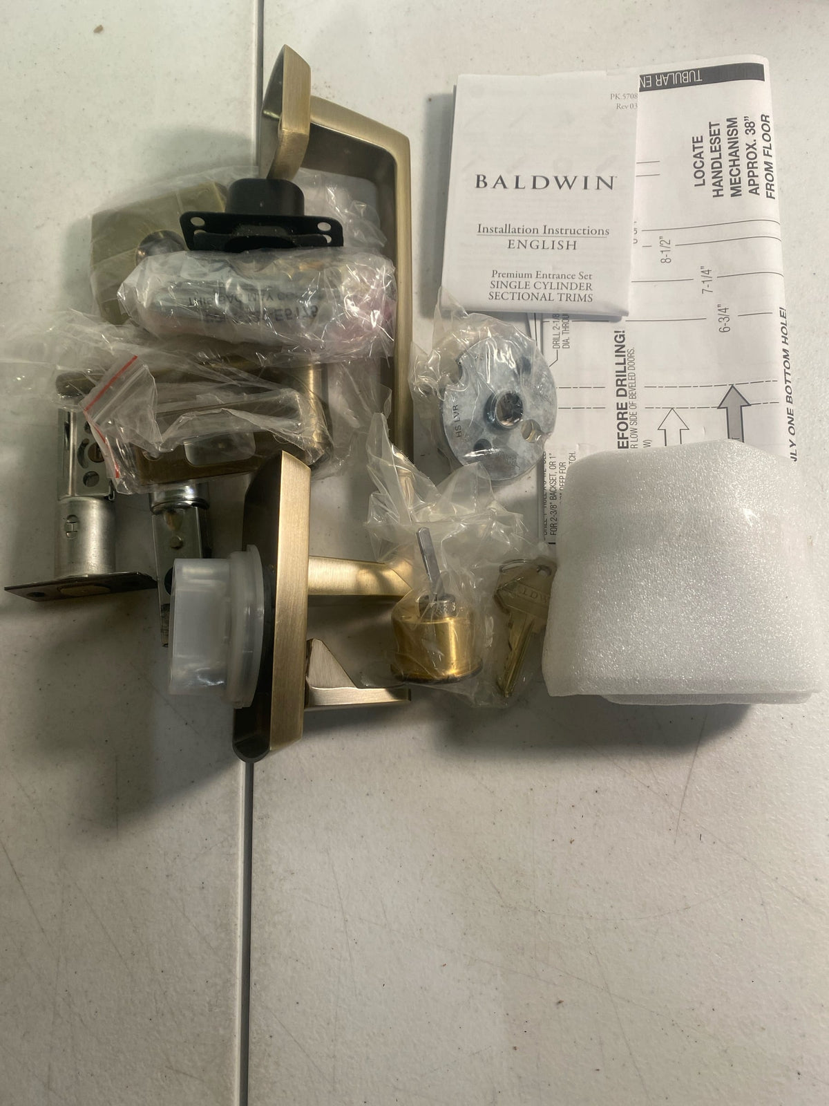Baldwin 85386050LENT Soho Left Handed Sectional Single Cylinder Keyed Entry Handleset with 5485V Interior Lever from the Estate Collection - Satin Brass and Black