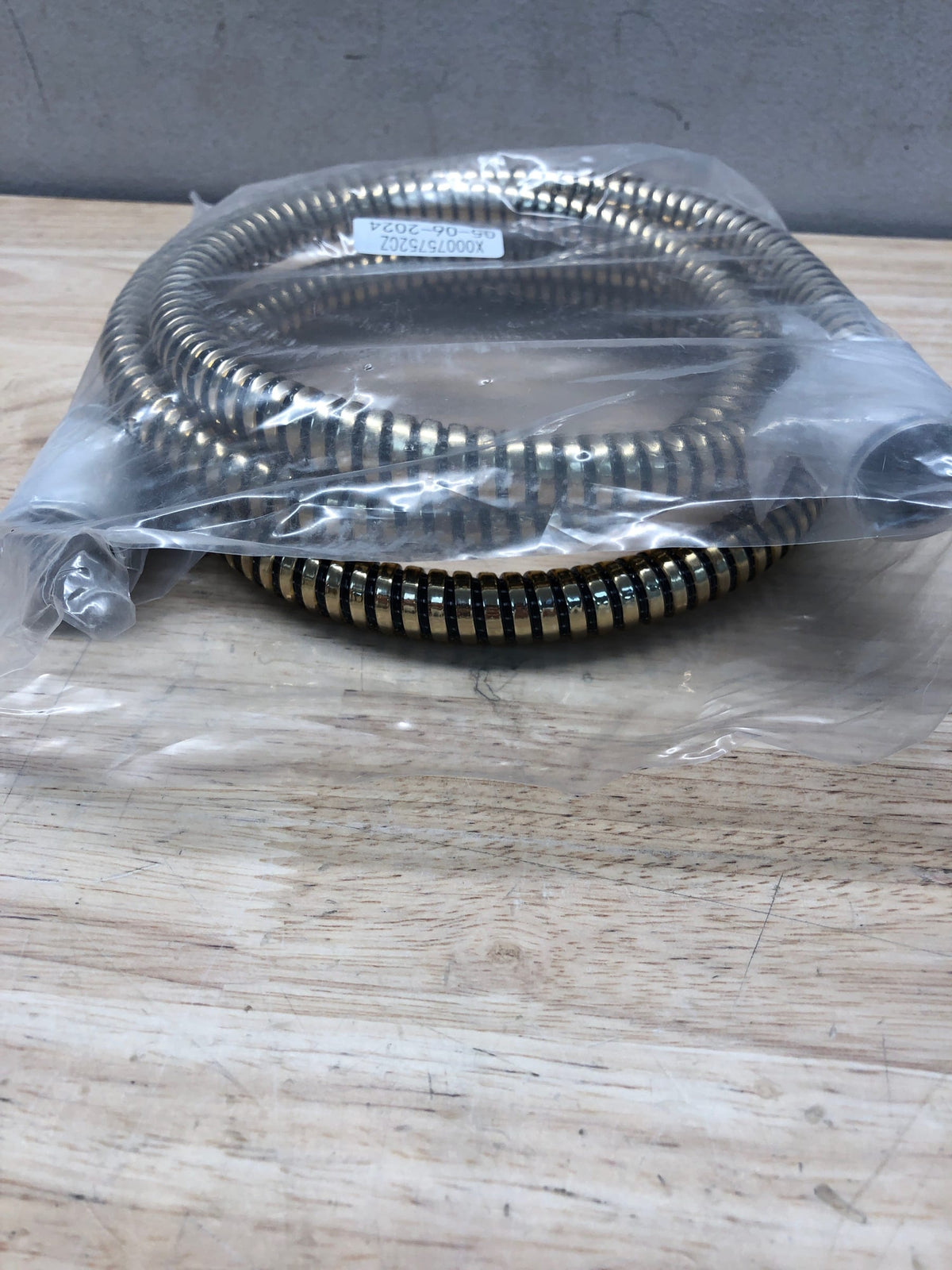 Delta Faucet RP64157CZ Handshower Hose, Champagne Bronze