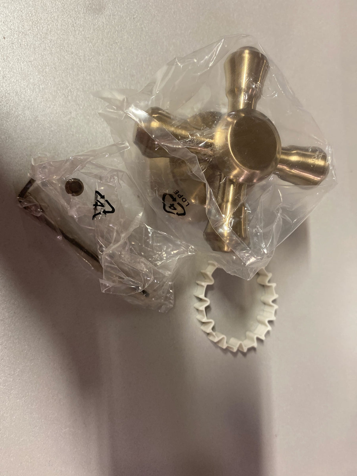 Delta H795CZ Cassidy Gold Tub and Shower Faucet Metal Cross Handle in Champagne Bronze