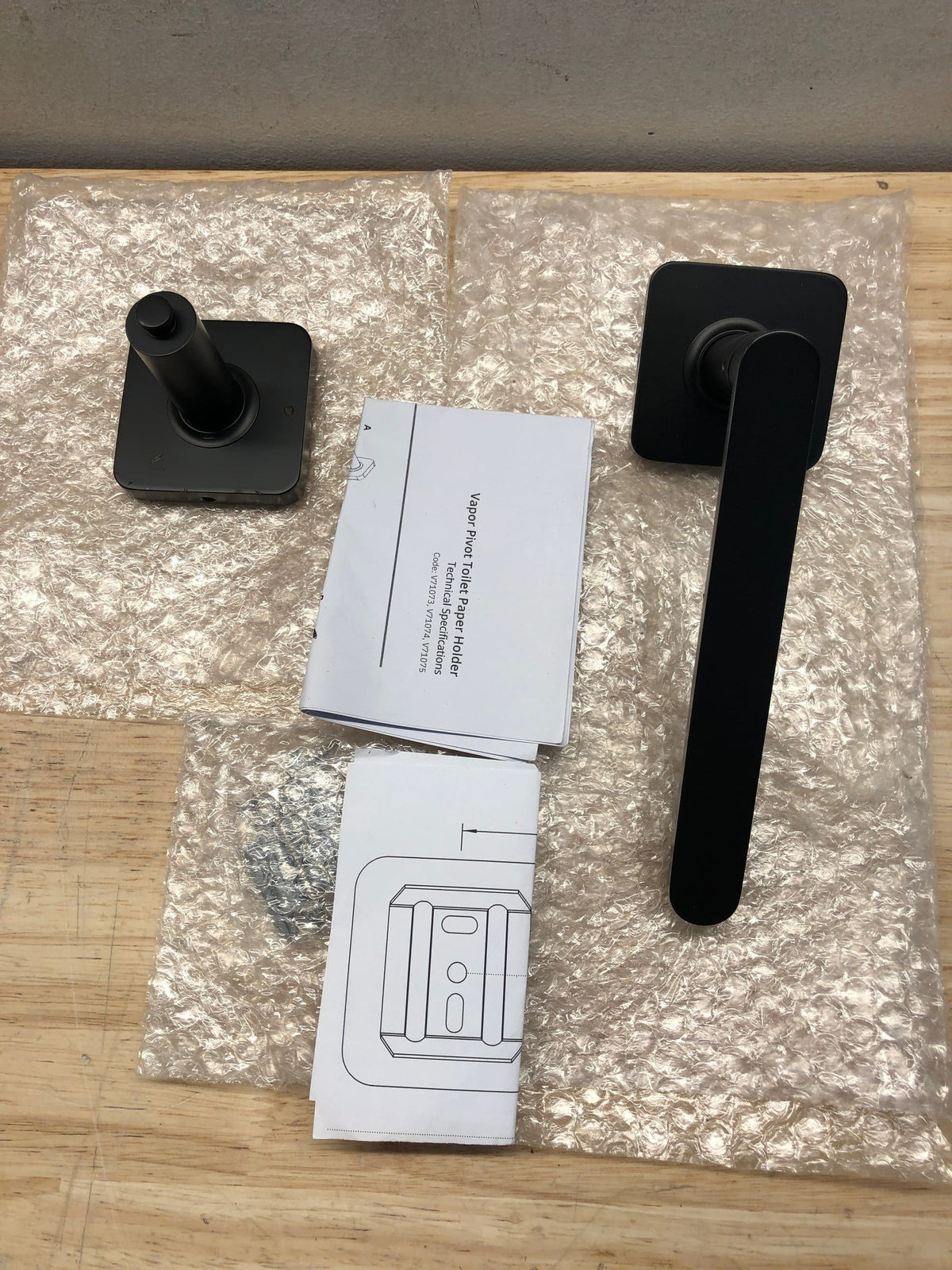 ICO Bath V71075 Volkano Vapor Wall Mounted Pivoting Toilet Paper Holder - Matte Black