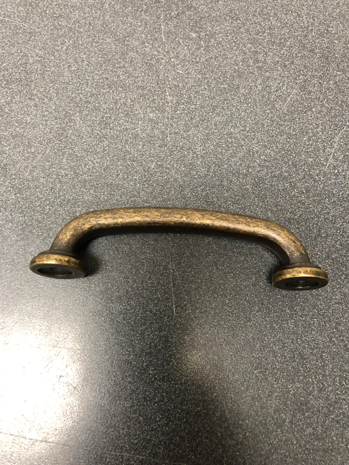 Jeffrey Alexander 527ABM-D Bremen 1 Series 3-3/4" Center to Center Curved Cabinet Handle / Drawer Pull - Distressed Antique Brass