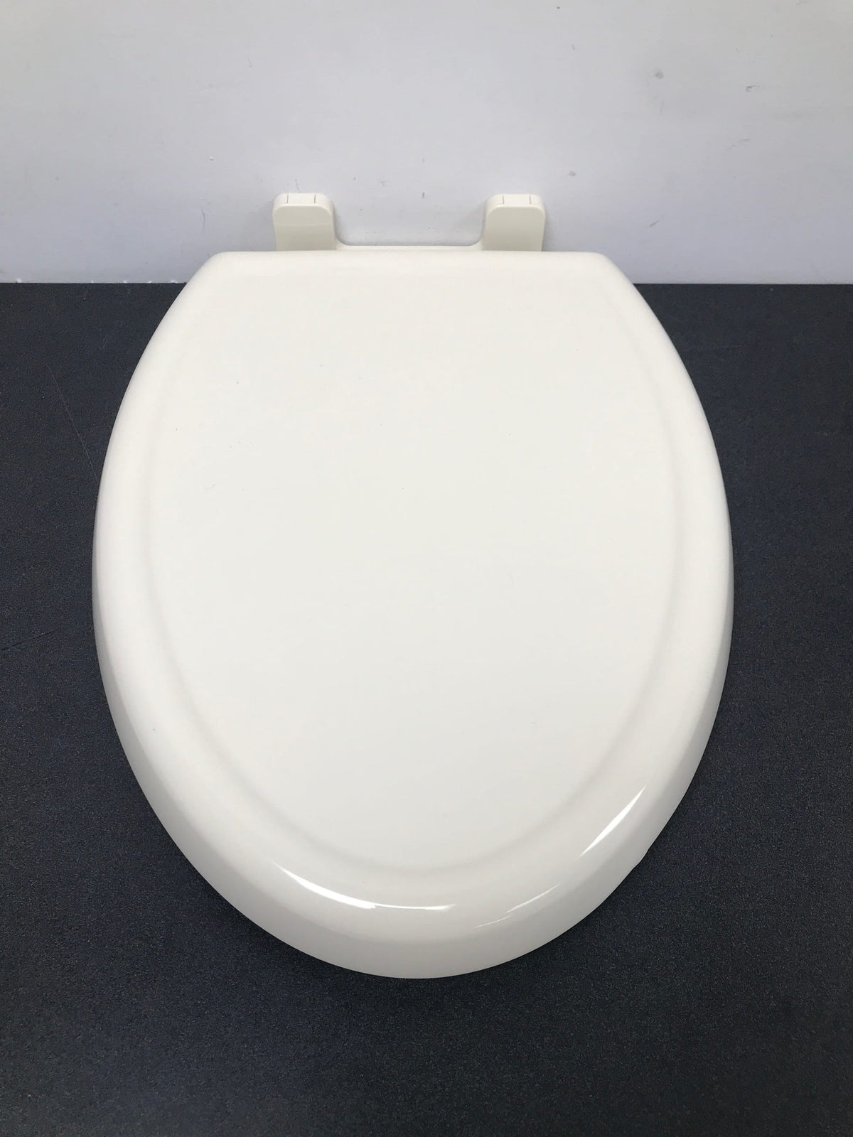 American Standard 5350110.021 Cadet 3 Elongated Slow Close Toilet Seat with Cover and EverClean Surface - Bone