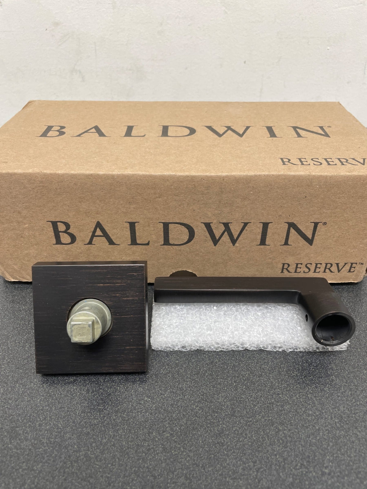 Baldwin PSSQUCSR112 Reserve Square Venetian Bronze Universal Hall/Closet Door Lever with Contemporary Square Rose