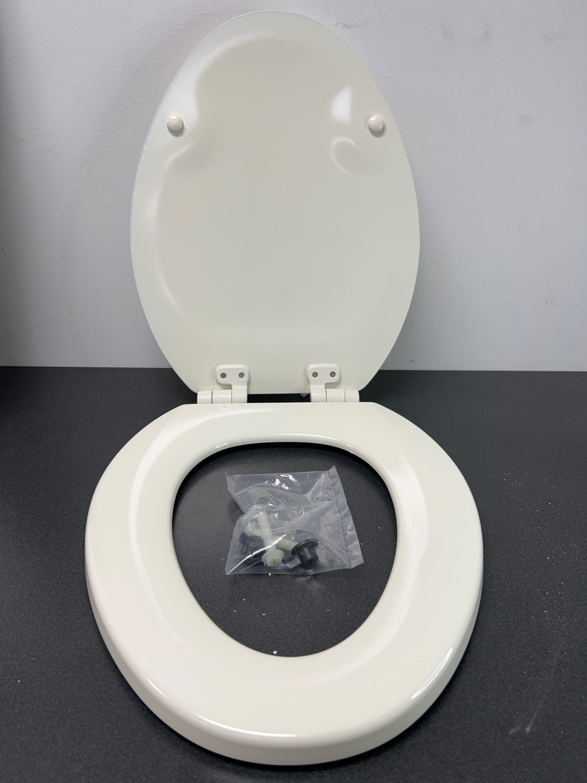Kohler K-20454-96 Ridgewood Elongated Molded Wood Toilet Seat with Quiet-Close - Biscuit