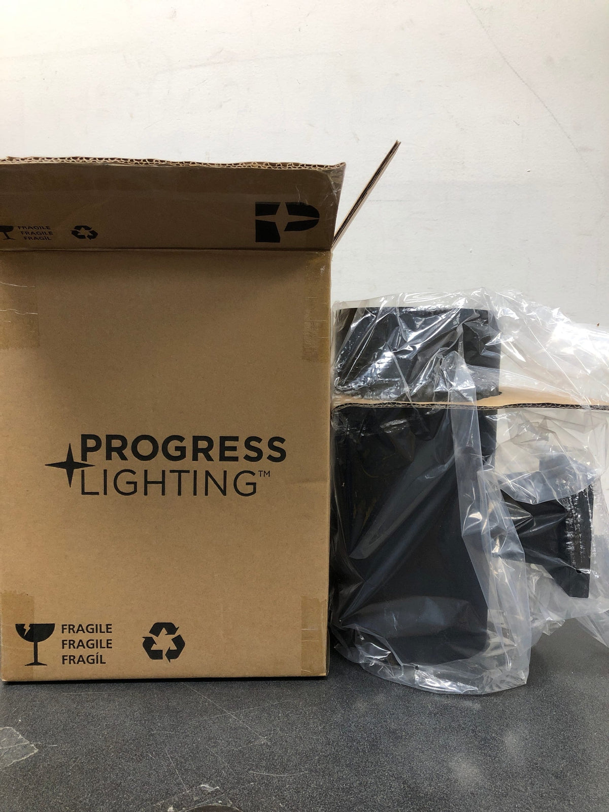 Progress Lighting P5641-31 Cylinder 1 Light Outdoor Wall Sconce with Metal Cylinder Shade - 12" Tall - Black