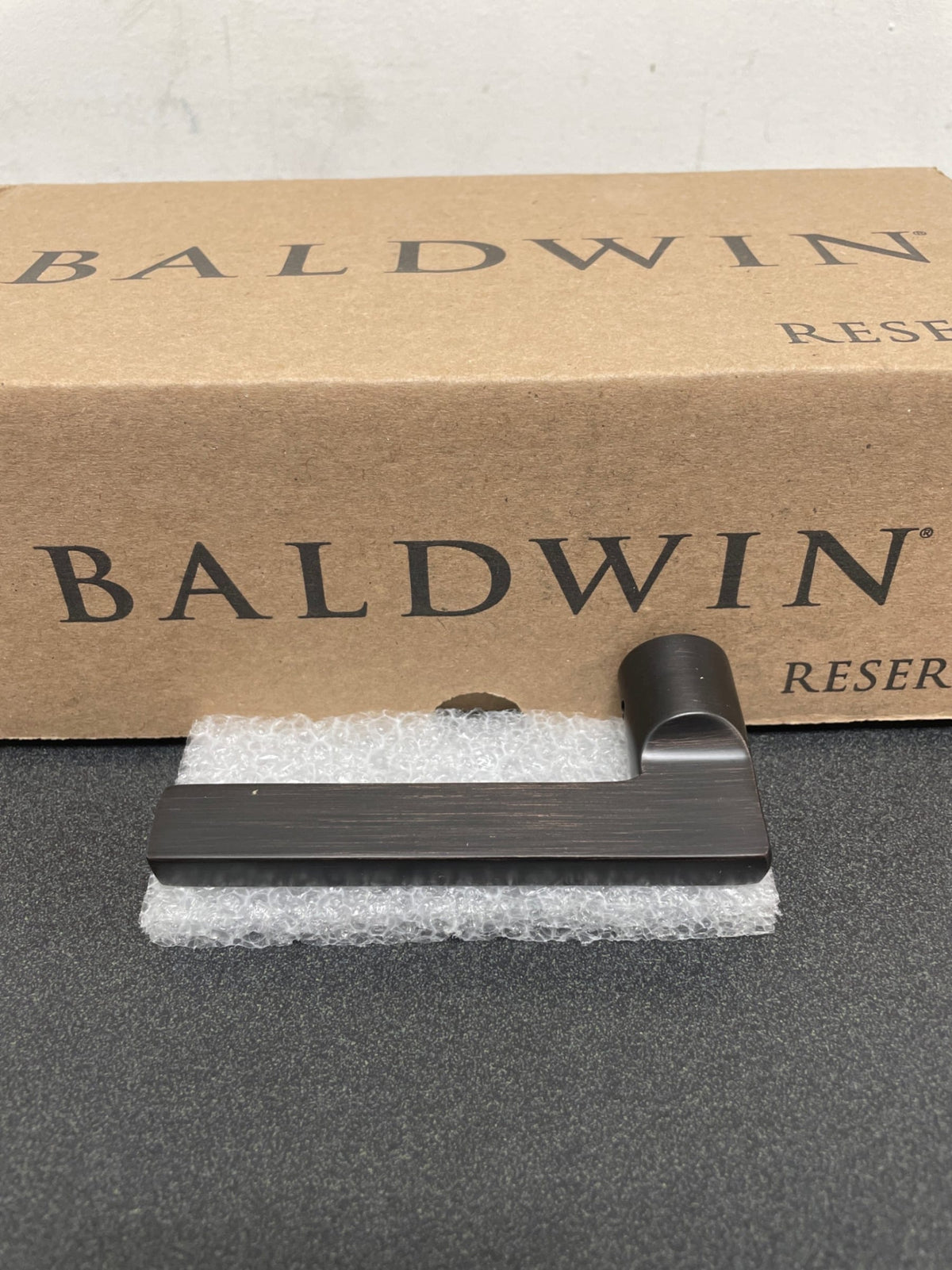 Baldwin PSSQUCSR112 Reserve Square Venetian Bronze Universal Hall/Closet Door Lever with Contemporary Square Rose