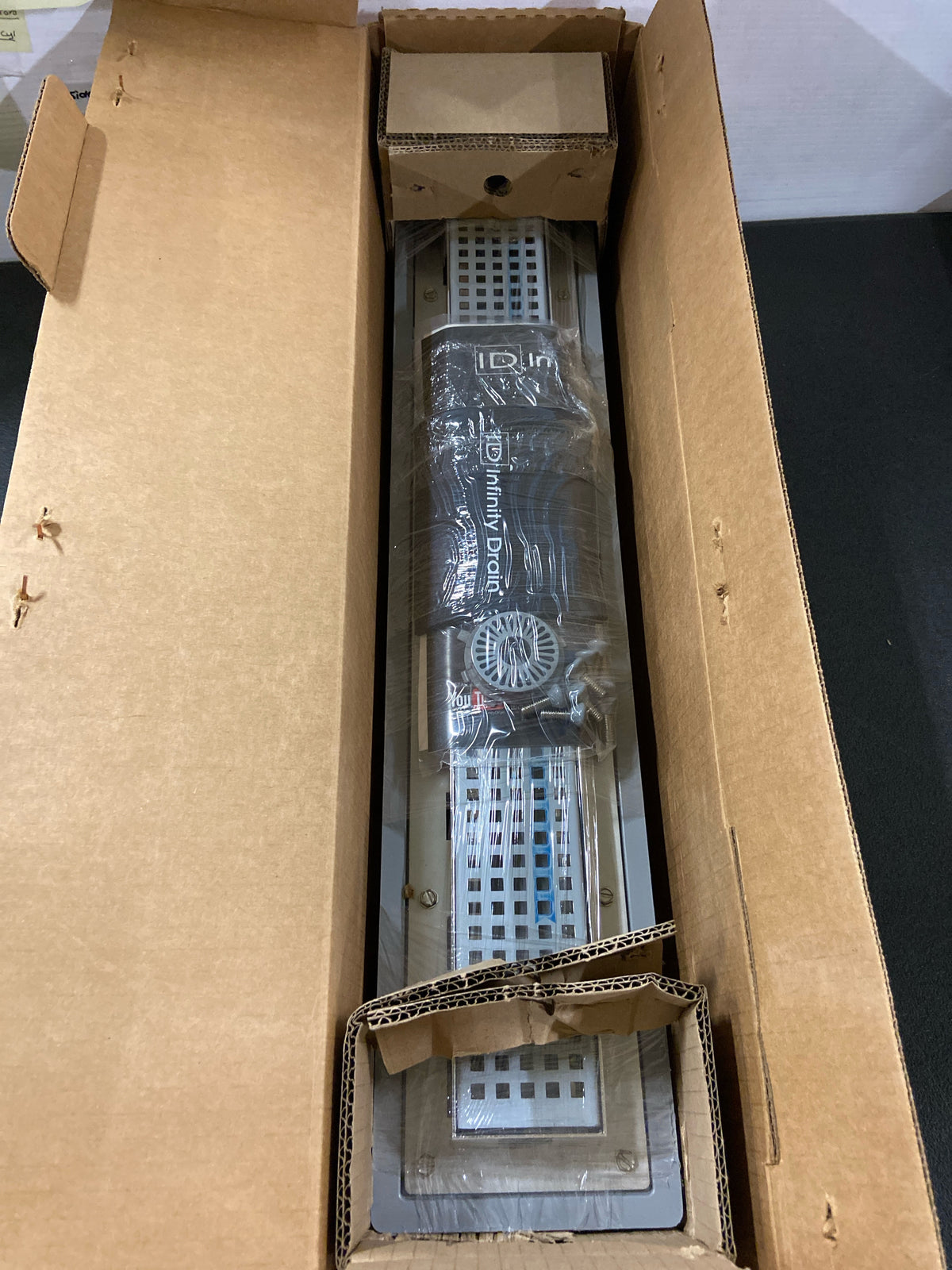 Infinity Drain: USQ-P 24 PS - 24" Complete Universal Infinity Drain Kit with PVC Channel and Squares Pattern Grate in Polished Stainless