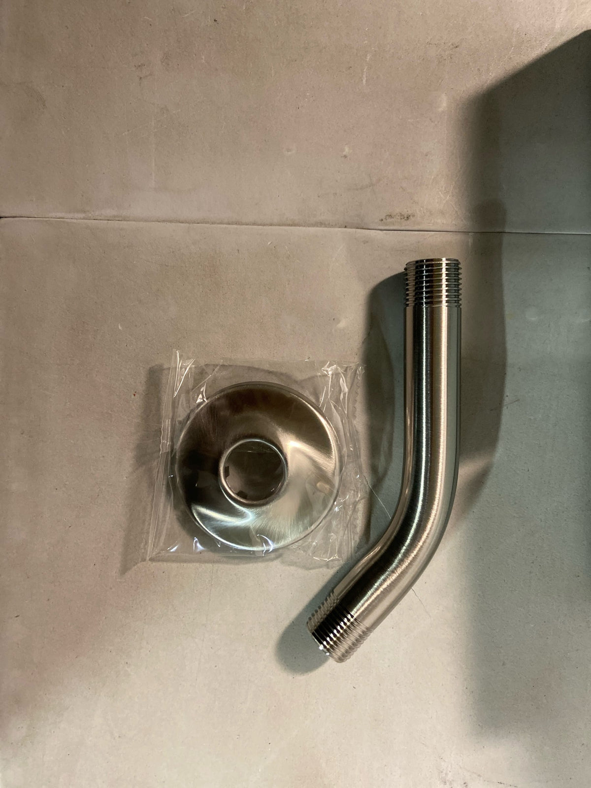 Delta 5-3/4" Wall Mounted Shower Arm and Shower Arm Flange