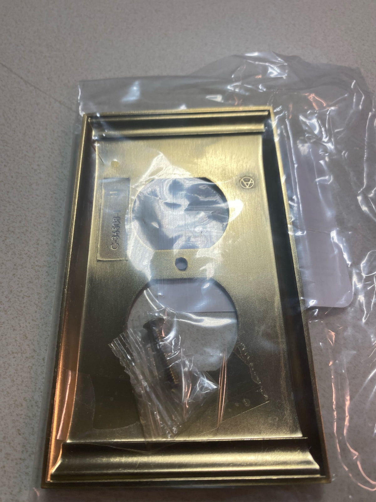Amerock | Wall Plate | Golden Champagne | Duplex Outlet Cover | Candler | 1 Pack | Electrical Outlet Cover