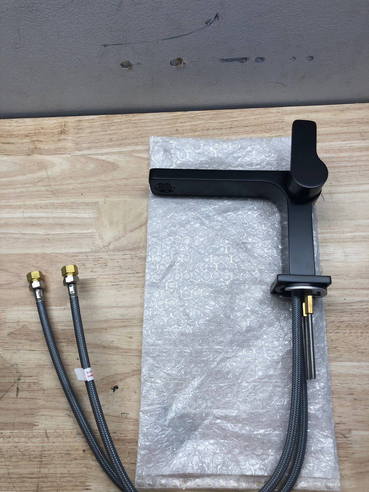 Signature hardware 447847 Hibiscus Single Handle Bathroom Faucet with Drain Kit Included in Matte Black