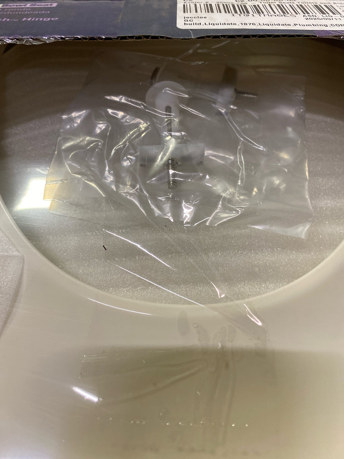Kohler 26802-96 Impro Round Ready Latch Quiet-Close Toilet Seat in Biscuit