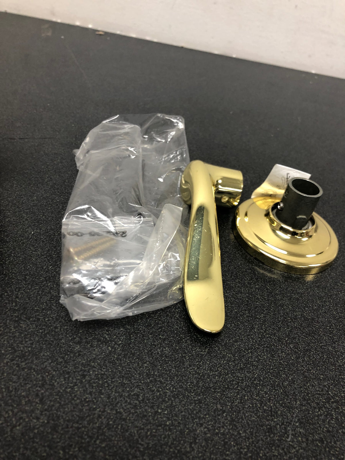 Kwikset tustin lever half dummy in bright brass