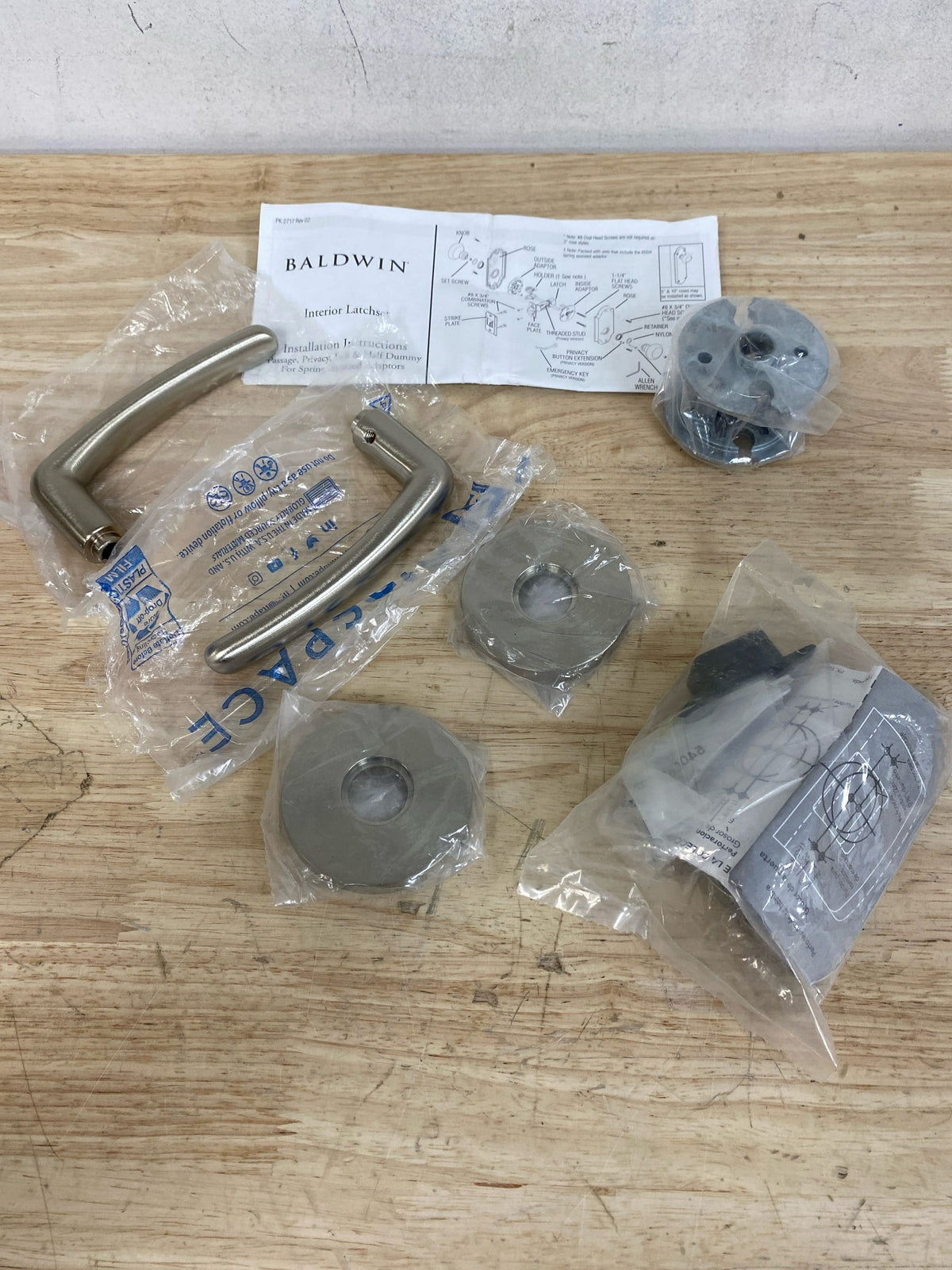 Baldwin 5165056PASS 5165 Passage Door Lever Set with 5046 Rose from the Estate Collection - Satin Nickel