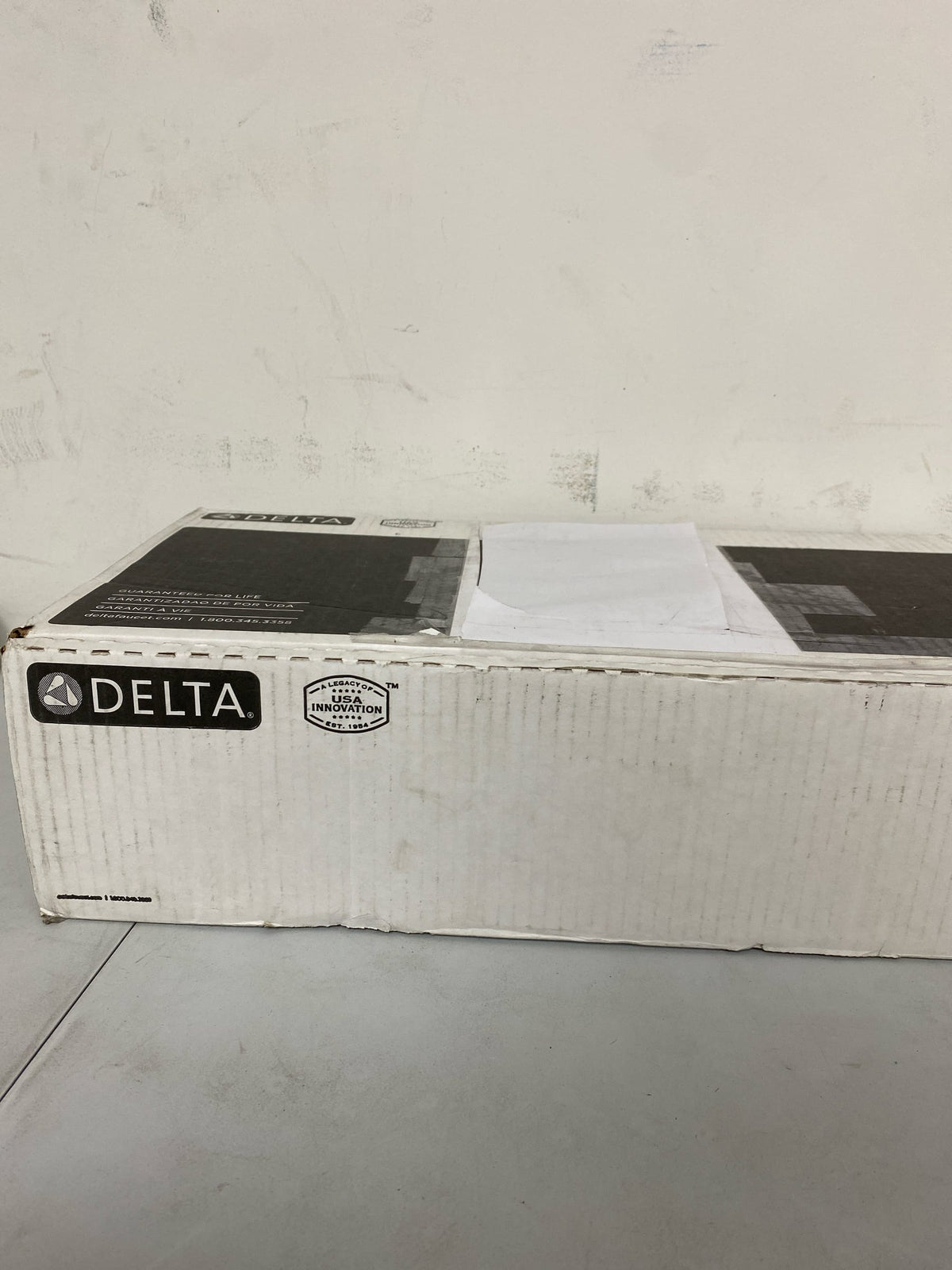 Delta 559HAR-CZPD-DST Trinsic 1.2 GPM Single Hole Bathroom Faucet with Pull Down Wand and Push Pop-Up Drain Assembly - Champagne Bronze