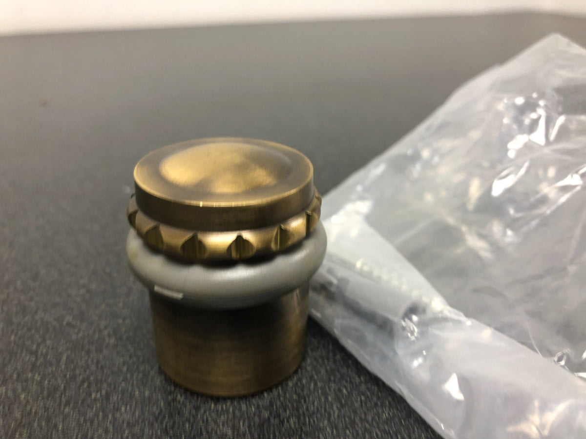 Deltana UFBP4505U5 1-5/8 Inch Height Solid Brass Round Universal Floor Bumper / Door Stop with Decorative Cap - Antique Brass
