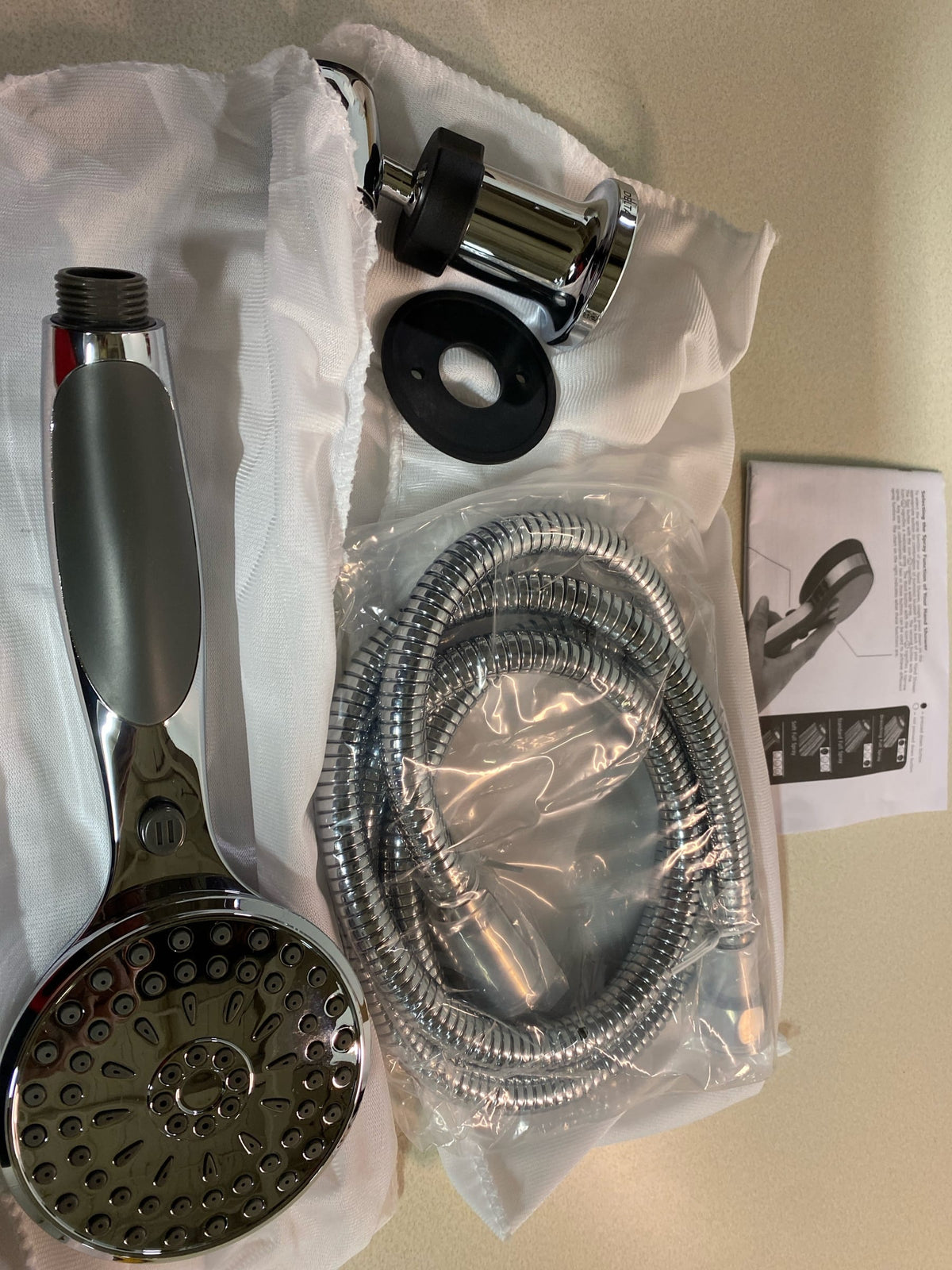 Delta Universal Showering Components 2.5 GPM Multi Function Hand Shower Package with Hose and Wall Holder