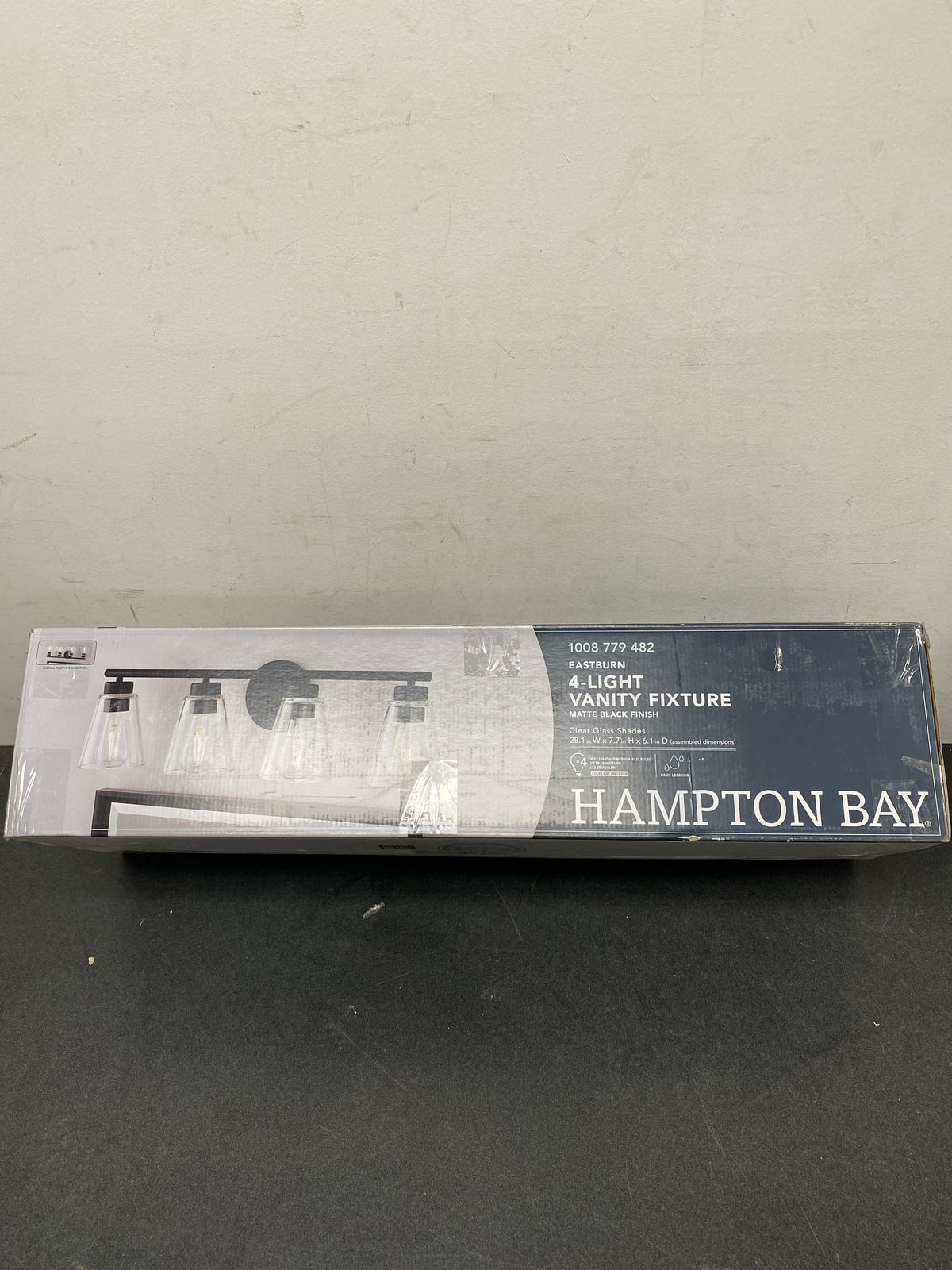Hampton bay HD32661D3 Eastburn 28.13 in. 4-Light Matte Black Vanity Light with Clear Glass Shades