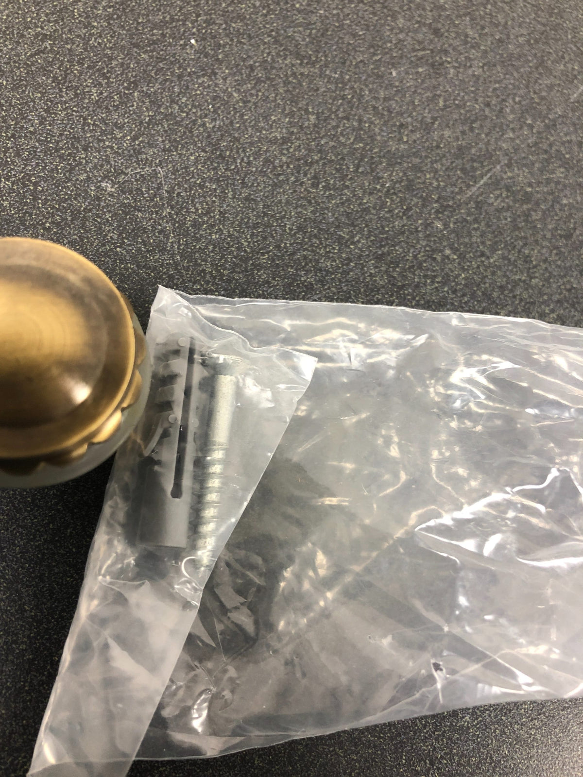 Deltana UFBP4505U5 1-5/8 Inch Height Solid Brass Round Universal Floor Bumper / Door Stop with Decorative Cap - Antique Brass