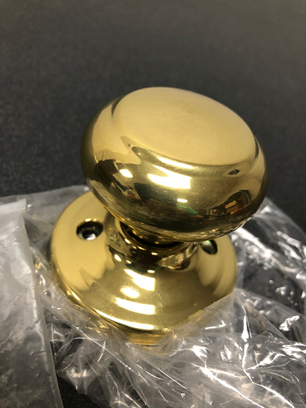 Weiser Lock GA12T3 Troy Single Dummy Door Knob from the Welcome Home Series - Polished Brass
