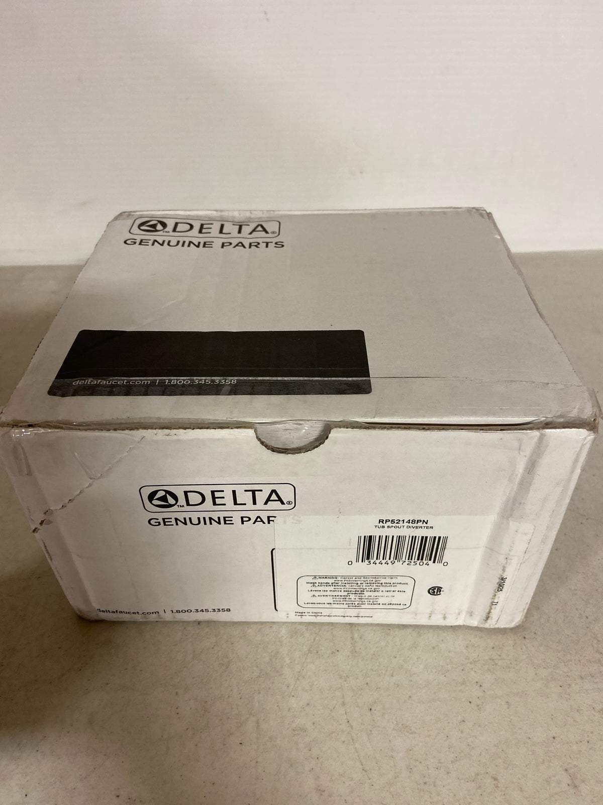 Delta Faucet RP52148PN Dryden, Tub Spout - Pull-Up Diverter, Polished Nickel
