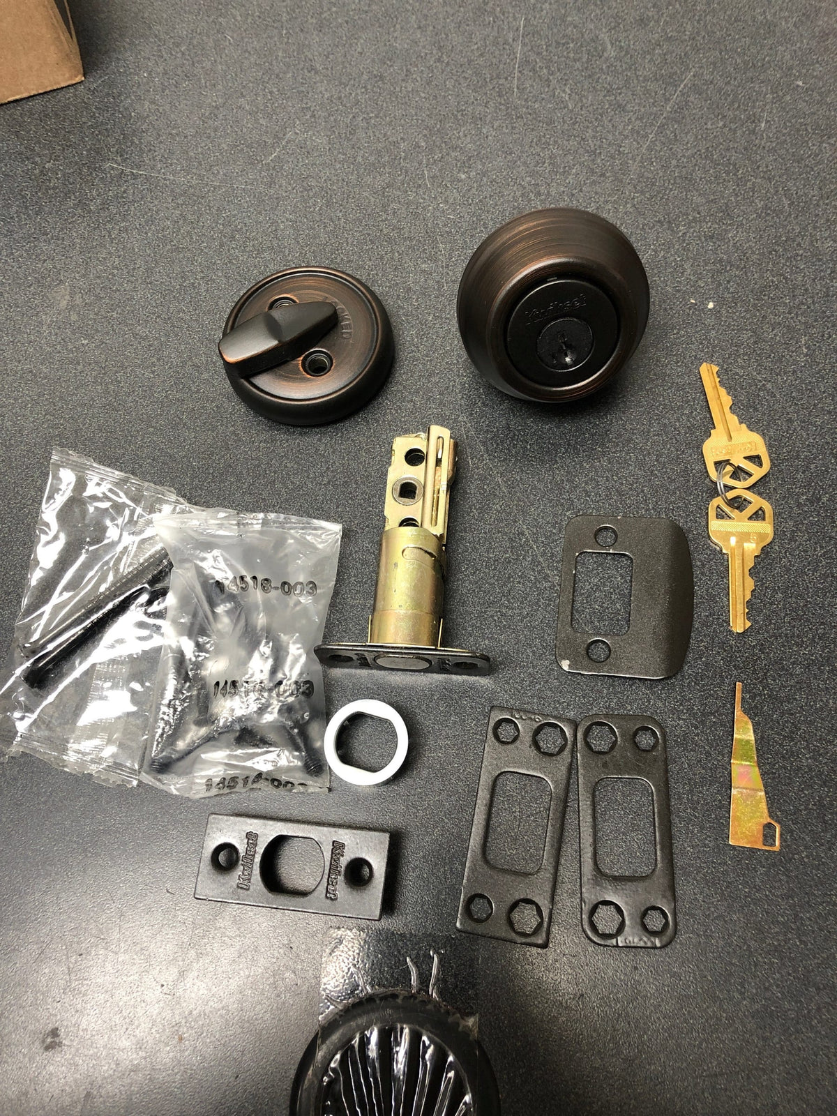 Kwikset 780-11PS.STRKP 780 Single Cylinder Keyed Entry Deadbolt with SmartKey from the Signature Series - Venetian Bronze