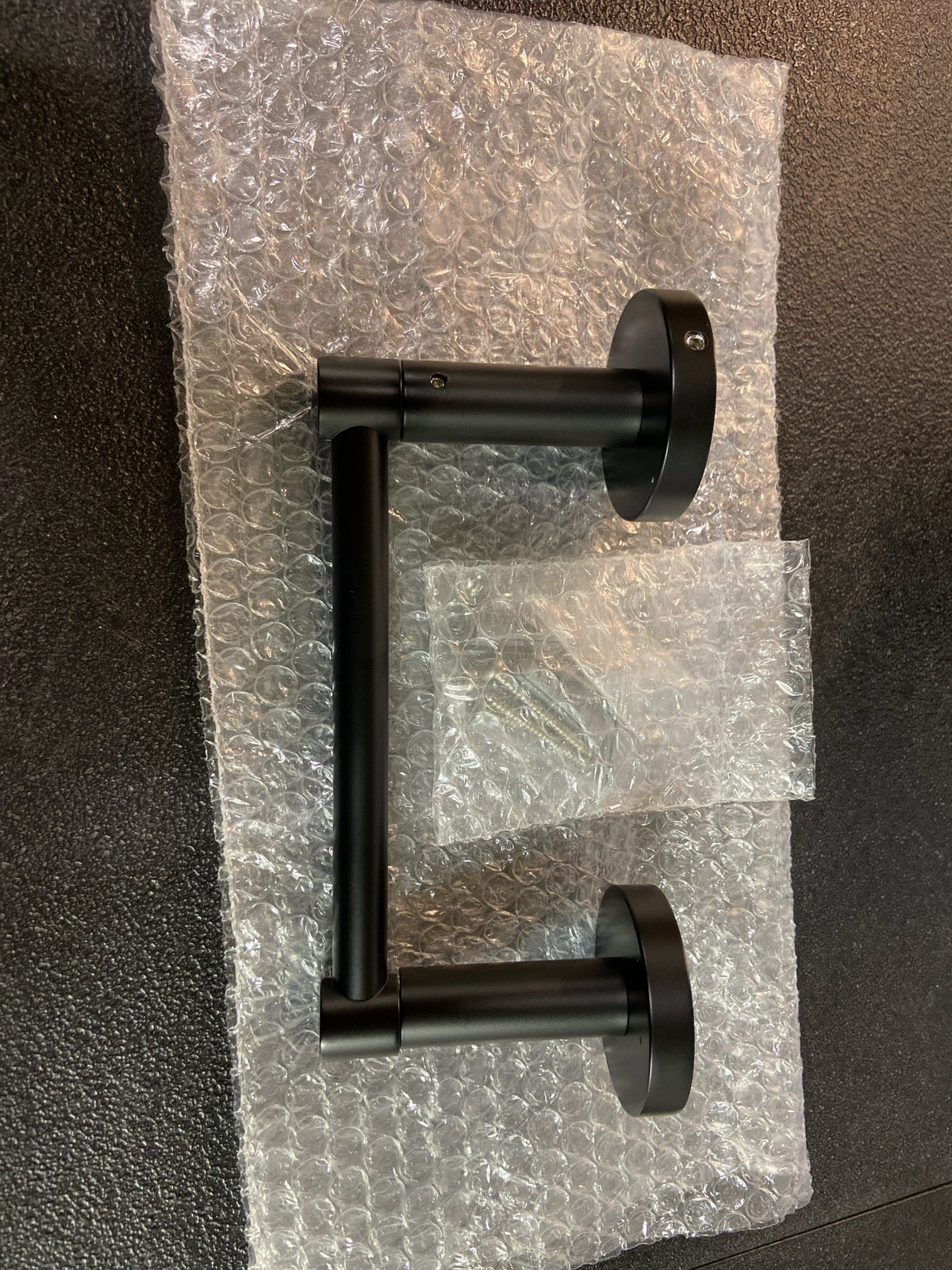 ICO Bath V67075 Lava Wall Mounted Pivoting Toilet Paper Holder - Matte Black
