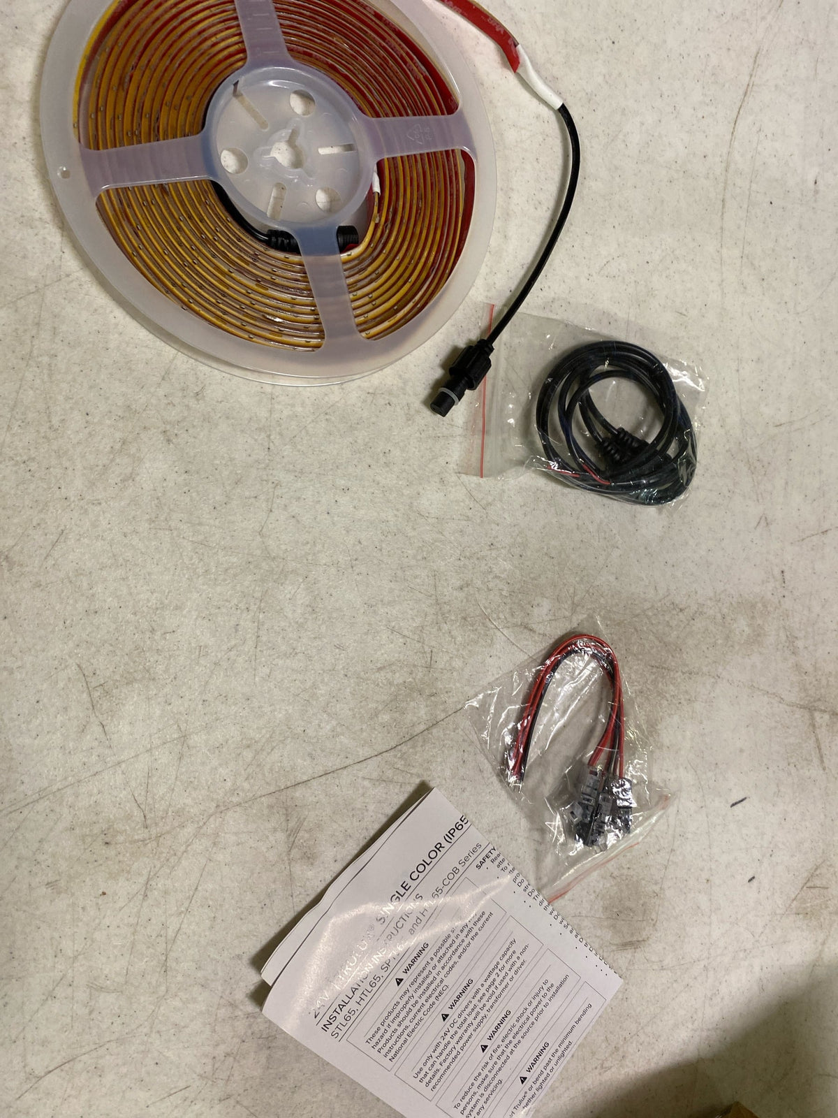 American Lighting HTL65-COB-WW-16 Trulux High Output Dotless LED Strip Light - 16.4 ft. Reel - IP65 Wet Location - 3000K - 5 W by ft. - 379 Lumens by ft. - 24 V, White