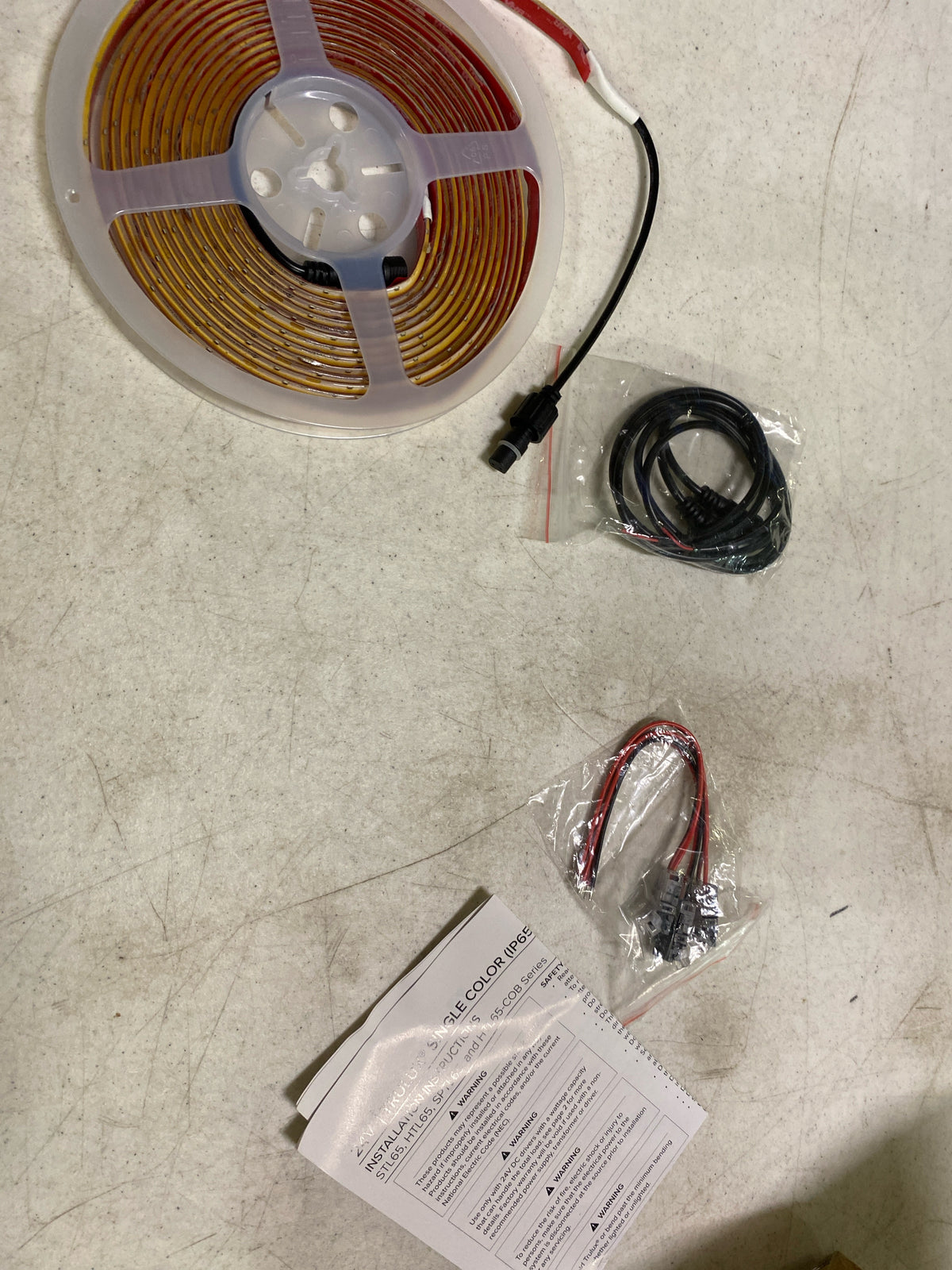 American Lighting HTL65-COB-WW-16 Trulux High Output Dotless LED Strip Light - 16.4 ft. Reel - IP65 Wet Location - 3000K - 5 W by ft. - 379 Lumens by ft. - 24 V, White