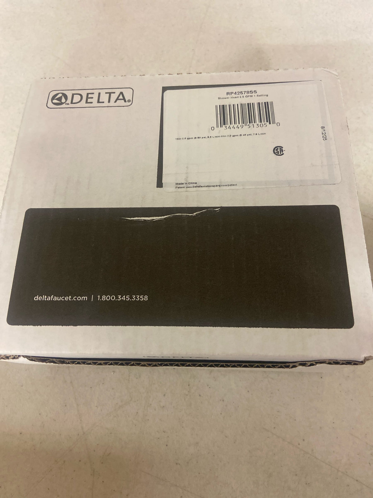 Delta RP42578SS Lockwood 1-Spray Patterns 2.5 GPM 5.88 in. Wall Mount Fixed Shower Head in Stainless