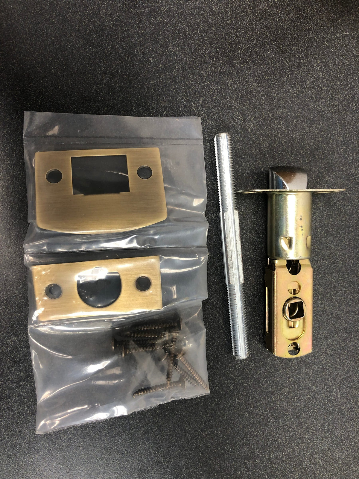 Signature Hardware 480935 Valma Solid Brass Passage Door Knob Set with Adjustable 2-3/8" or 2-3/4" Backset - Antique Brass