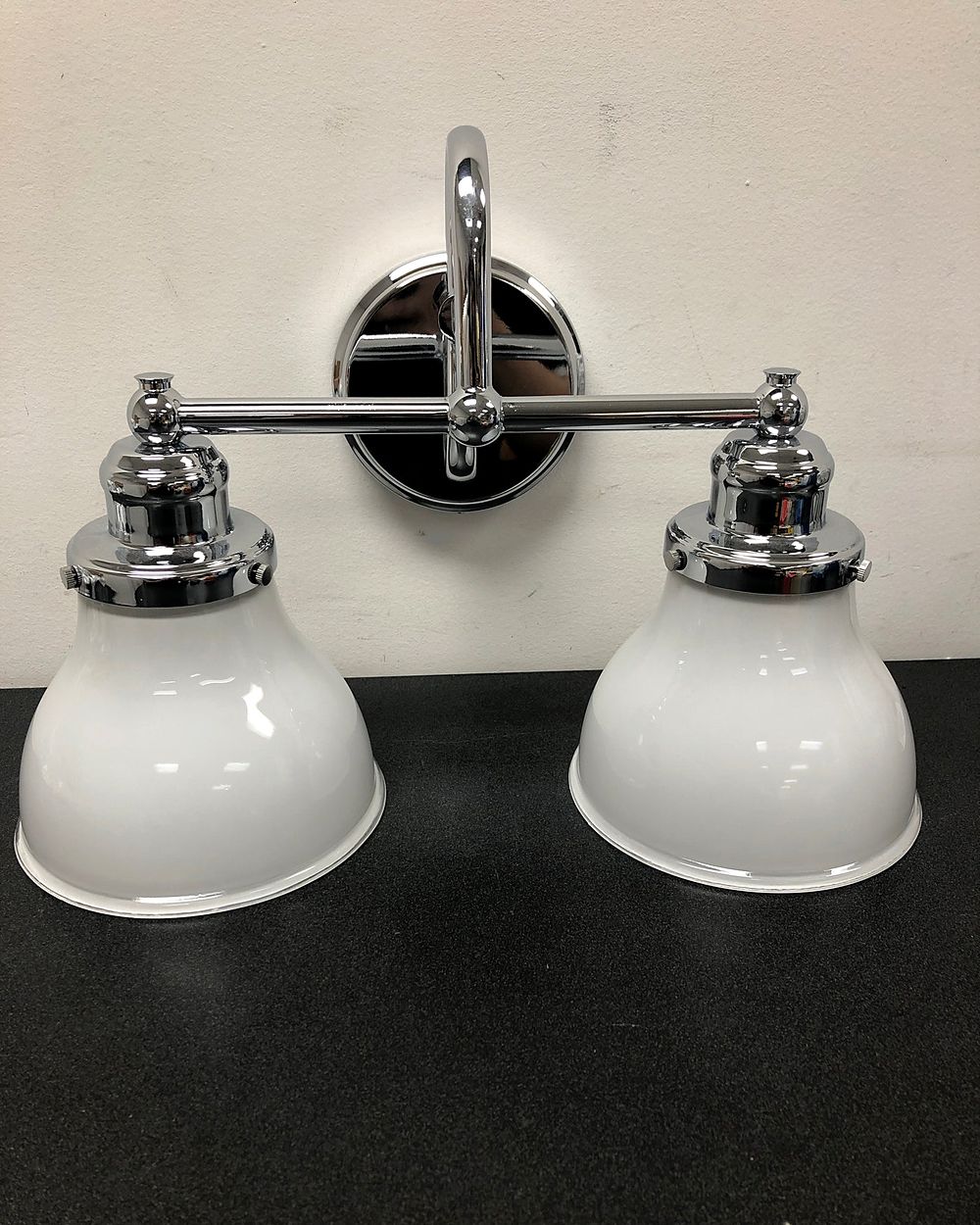 Chrome two-light vanity fixture from Zokos inventory
