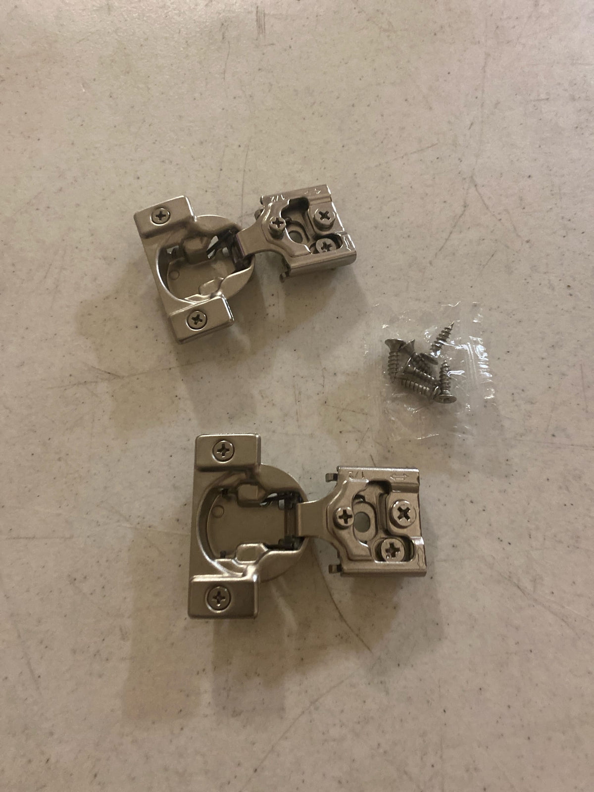 Amerock BP9235SLFF 1/2" (13mm) Overlay Face Frame Self-Close Concealed Cabinet Hinge - 1 Pair - Nickel