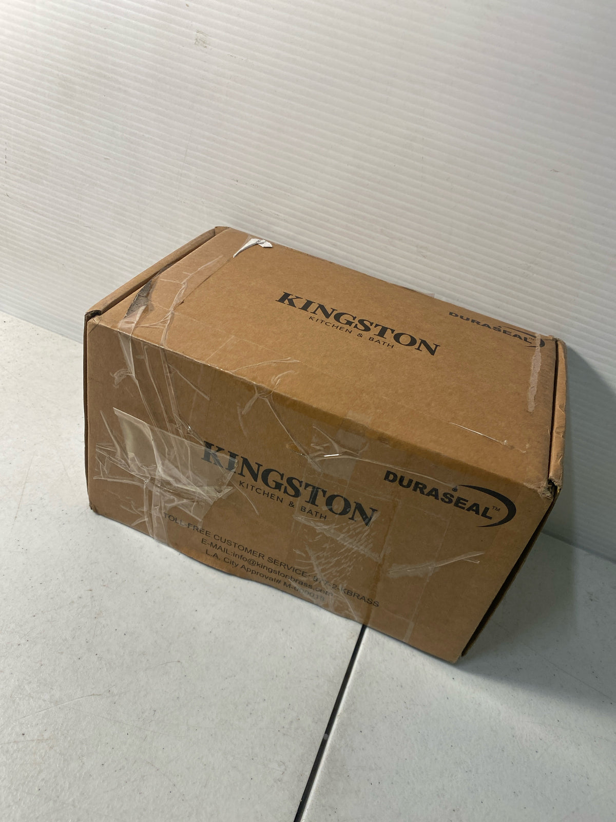 Kingston Brass GKB602B Restoration 1.2 GPM Centerset Bathroom Faucet with Pop-Up Drain Assembly - Polished Brass