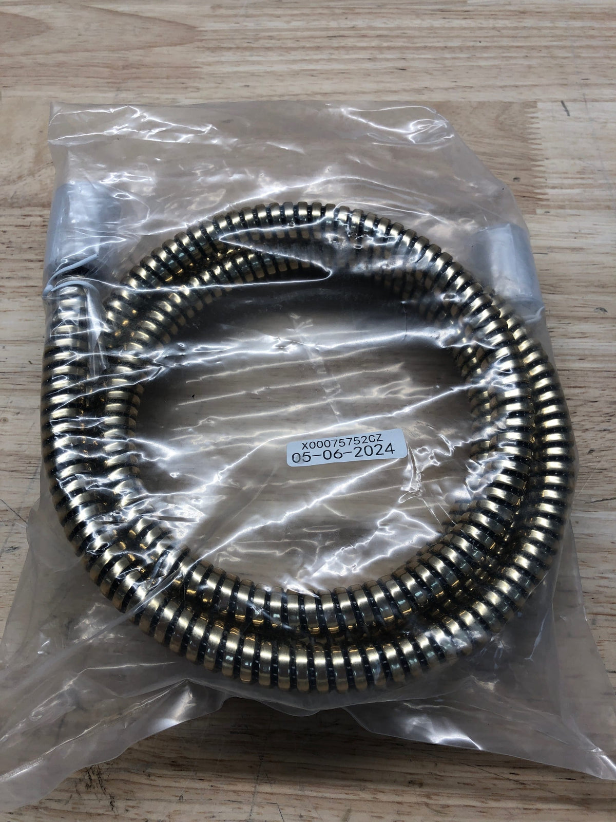 Delta Faucet RP64157CZ Handshower Hose, Champagne Bronze