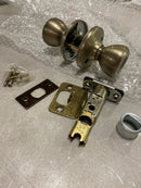 Kwikset Tylo Interior Passage Door Knob, Handle For Closet and Hallway Doors, Non-Locking Doorknob in Antique Brass, with Microban Protection