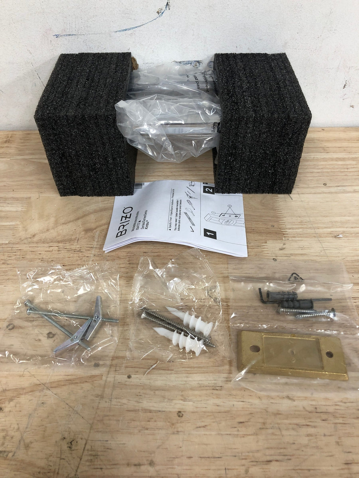 Brizo Kintsu: 8" Pivoting Towel Bar - 694707-PC