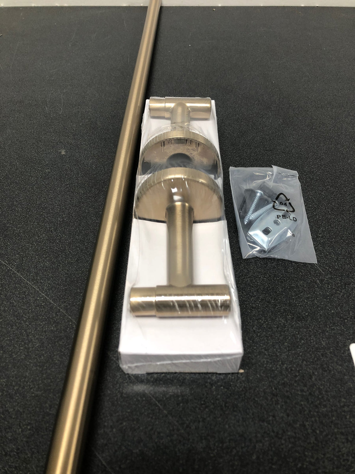 Delta Trinsic 24-in Champagne Bronze Wall Mount Single Towel Bar