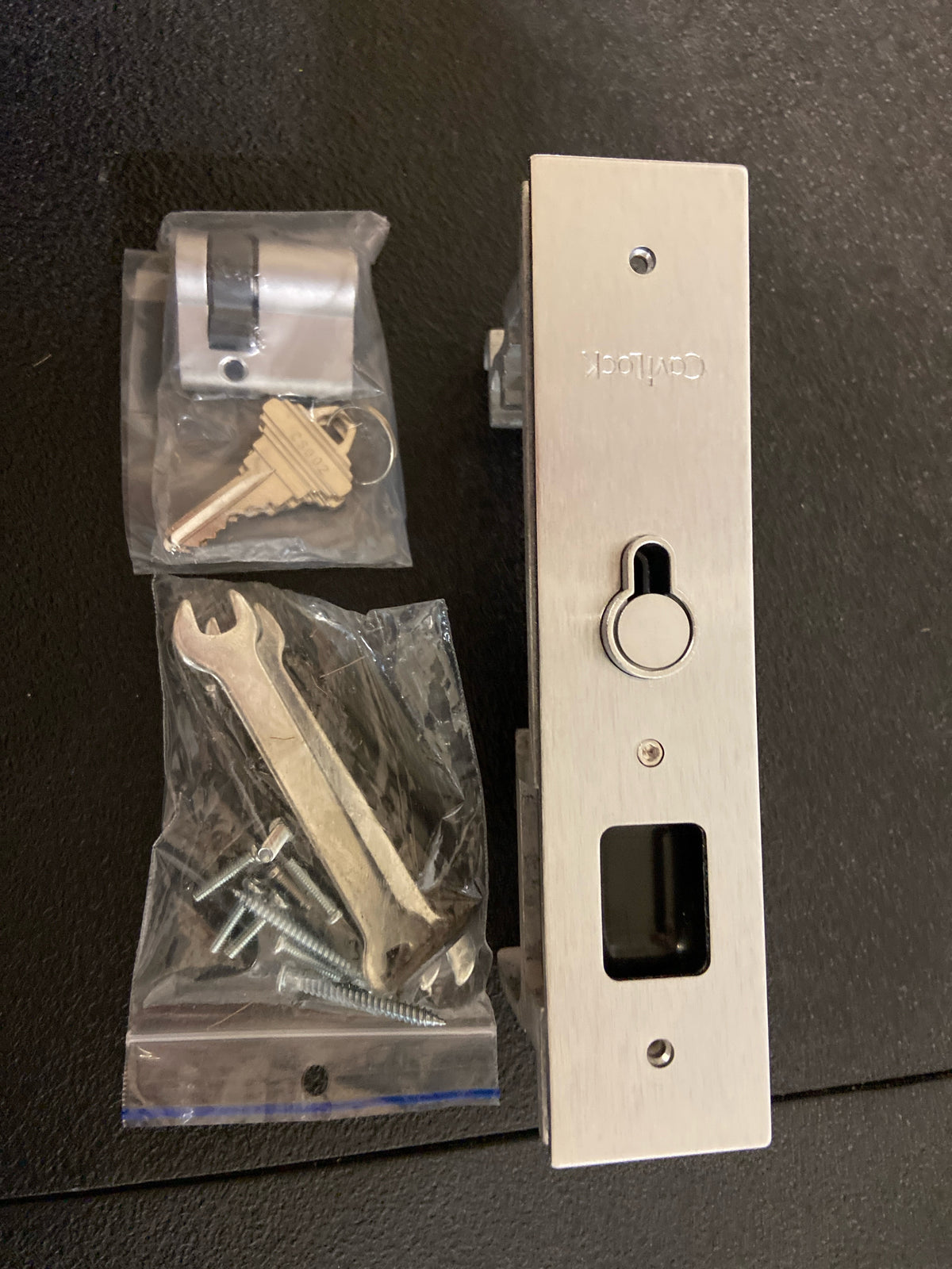 Cavilock CL400C0138 Magnetic Keyed Entry Pocket Door Lock Set with RH Snib/LH Key for 1-3/4 Inch Thick Doors - Satin Chrome
