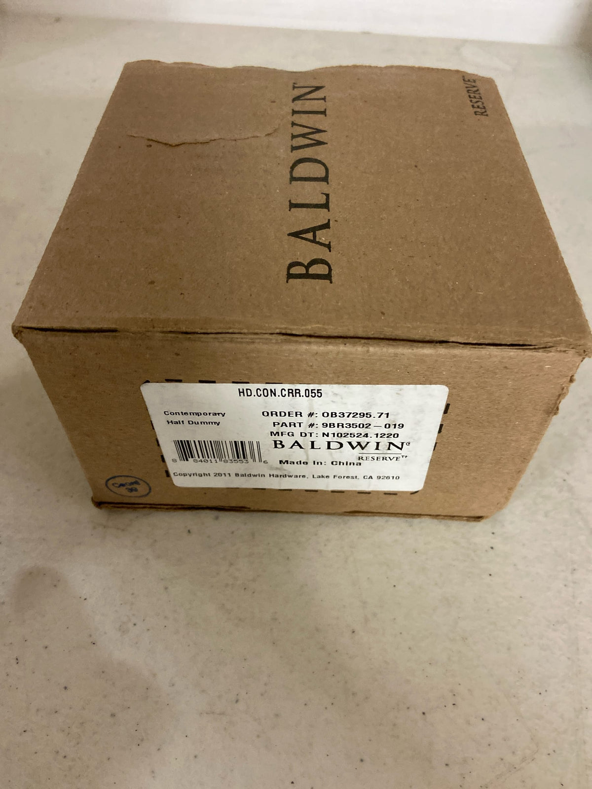 Baldwin HD.CON.CRR Modern Single Dummy Door Knob with Modern Round Rose from the, Polished Nickel