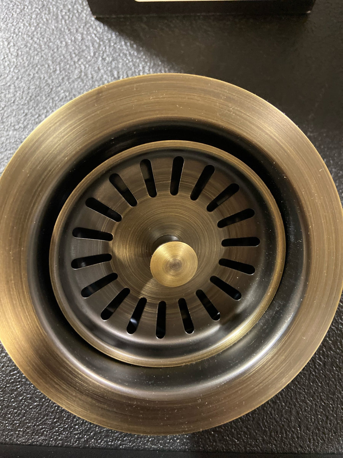 Signature Hardware 483693 4-1/2" Garbage Disposal Flange with Stopper for Sinks up to 5/8" Thick - Aged Brass