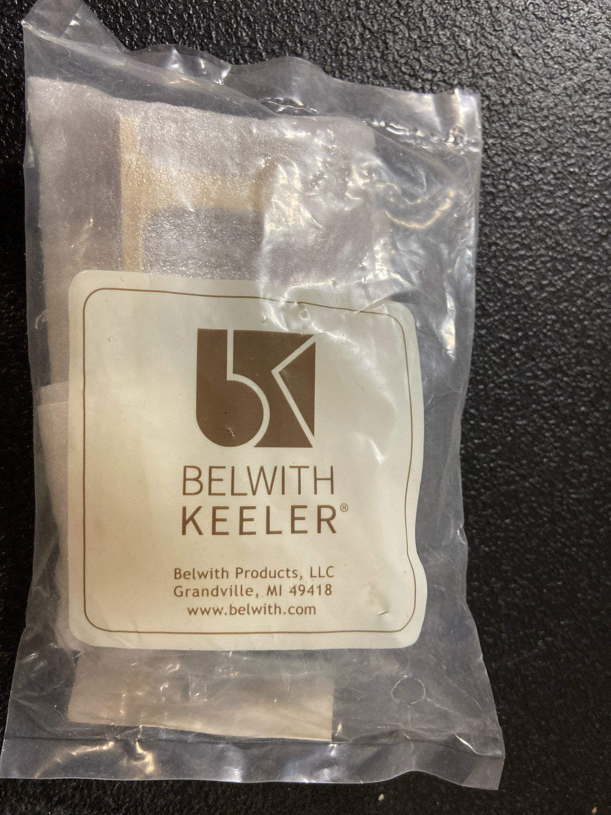 Belwith Keeler B077978LRBGB Reserve 3" Center to Center Leather Cabinet Handle / Drawer Pull - Mixed Materials - Brushed Golden Brass / Brown Leather