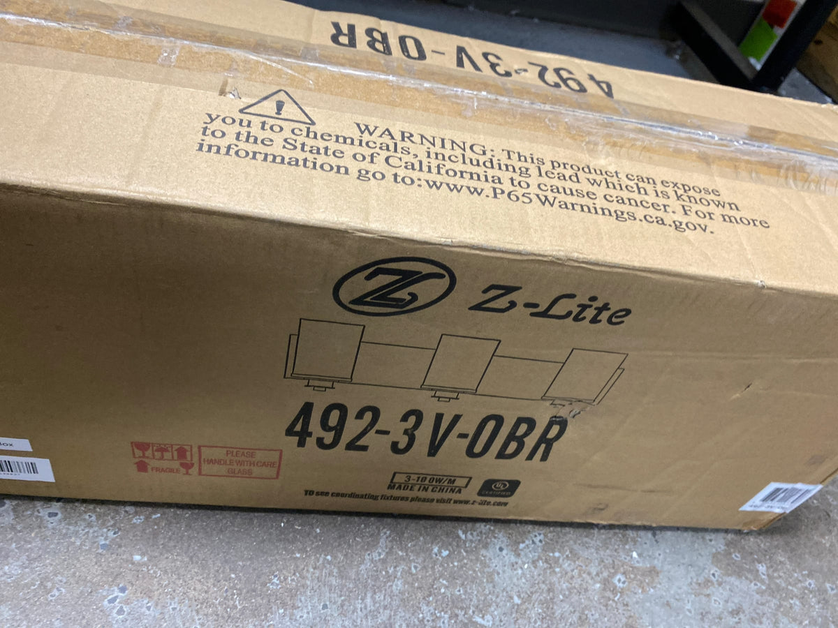 Z-Lite 492-3V-OBR Beckett 3 Light 23" Wide Bathroom Vanity Light - Olde Brass